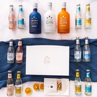 gin staycation gift box bottles garnish pack laid out on flat background